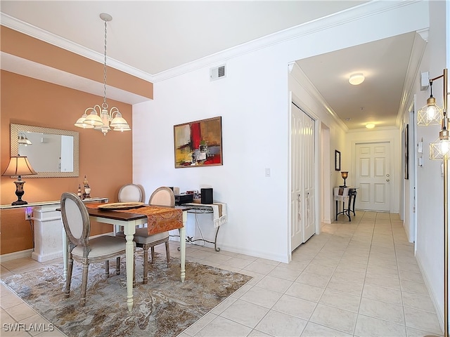 tiled dining space featuring a notable chandelier and crown molding