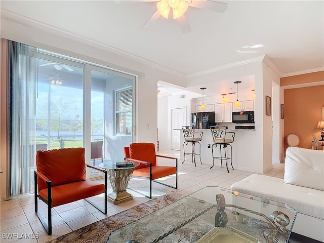 tiled living room featuring crown molding and ceiling fan