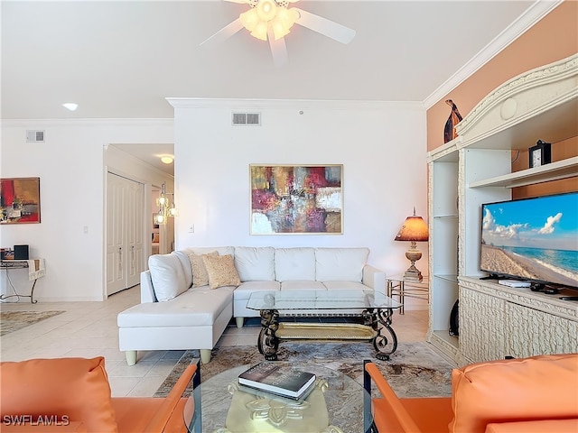 tiled living room with ceiling fan and ornamental molding