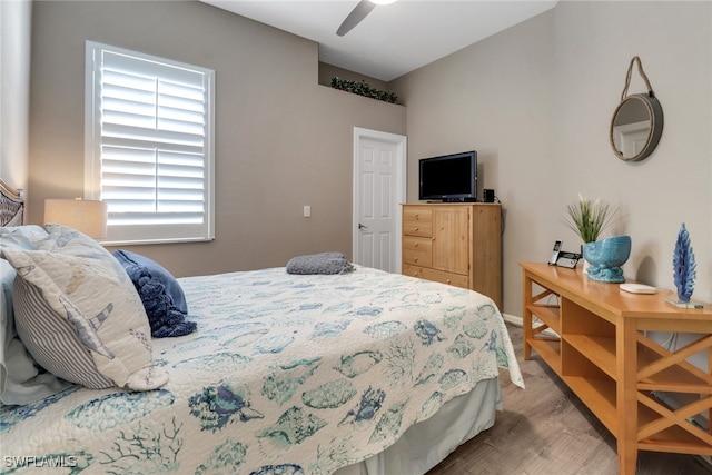 bedroom featuring ceiling fan and hardwood / wood-style floors