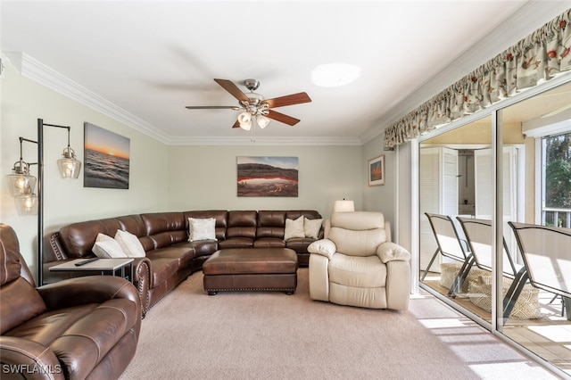 living room with carpet flooring, ceiling fan, and ornamental molding