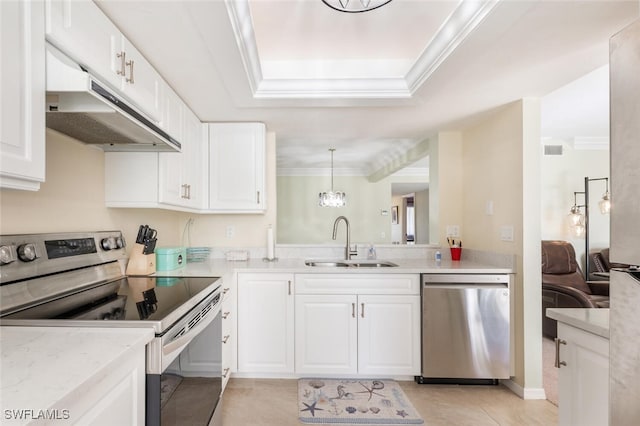 kitchen featuring pendant lighting, white cabinetry, sink, and stainless steel appliances