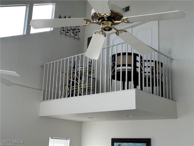 interior details featuring ceiling fan