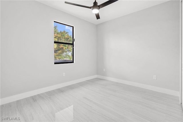 unfurnished room featuring light wood-type flooring and ceiling fan