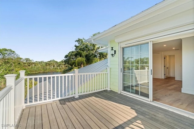 deck featuring a water view