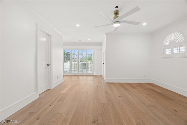 spare room with ornamental molding, baseboards, light wood-type flooring, ceiling fan, and recessed lighting