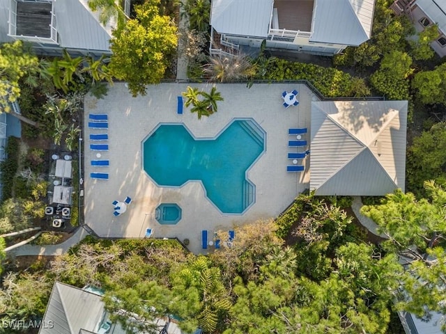 view from above of property with a pool area