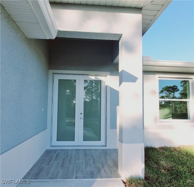 doorway to property featuring french doors