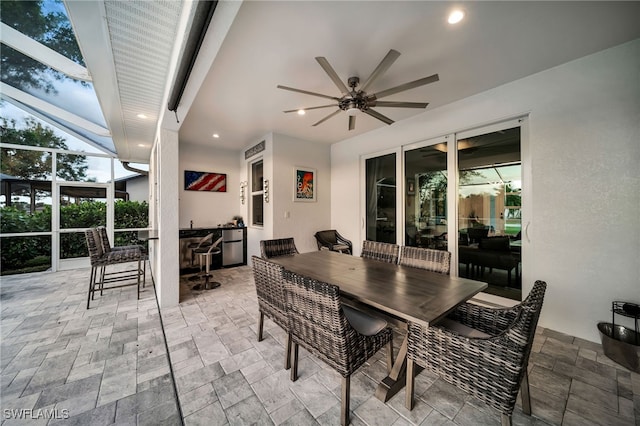 dining space featuring ceiling fan