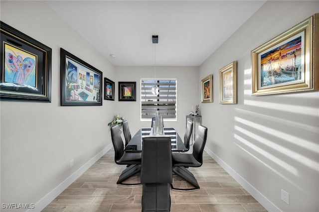 dining space featuring light hardwood / wood-style flooring