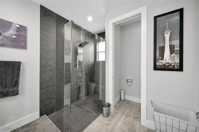 bathroom featuring tiled shower