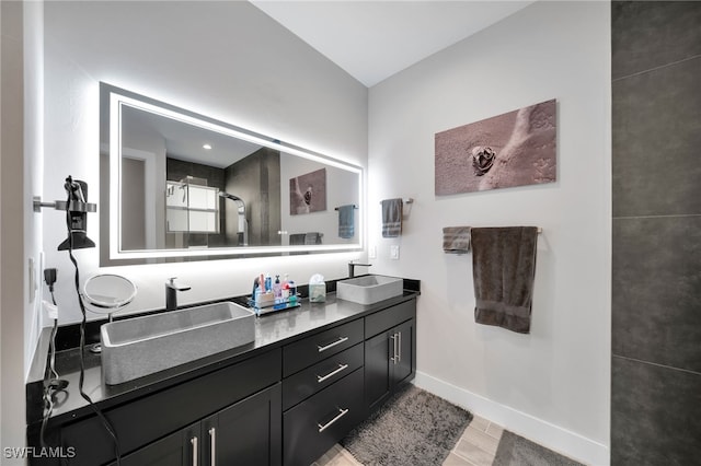 bathroom with vanity, hardwood / wood-style flooring, and walk in shower