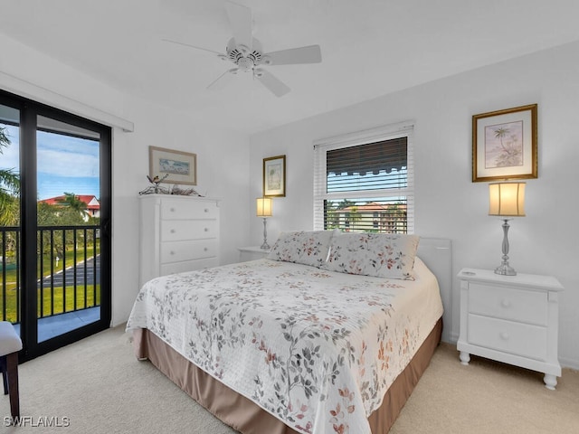 bedroom featuring ceiling fan, light colored carpet, and access to outside