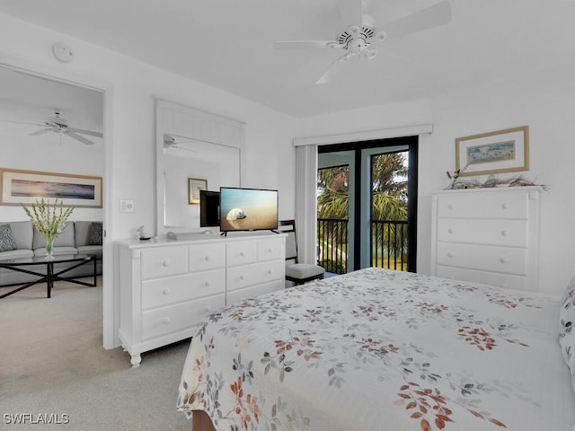 carpeted bedroom with ceiling fan and access to exterior