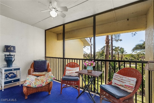 balcony featuring ceiling fan