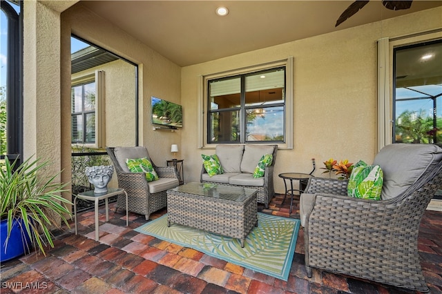 view of patio / terrace featuring outdoor lounge area and ceiling fan