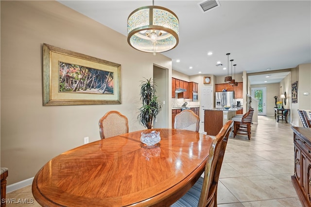 view of tiled dining area