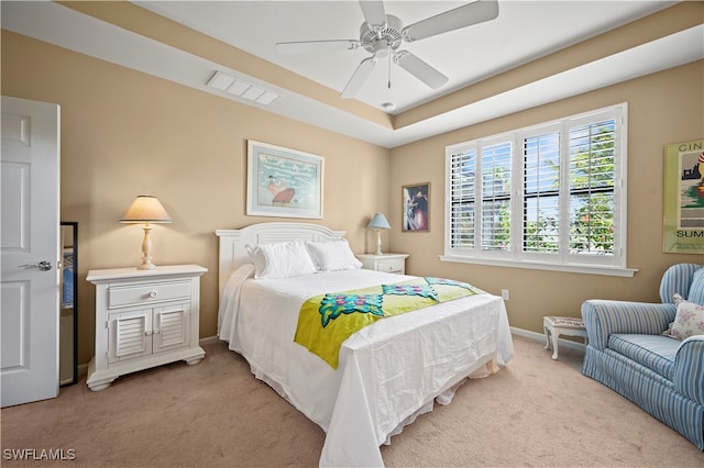 carpeted bedroom with ceiling fan