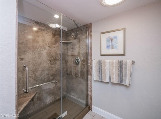 bathroom featuring an enclosed shower