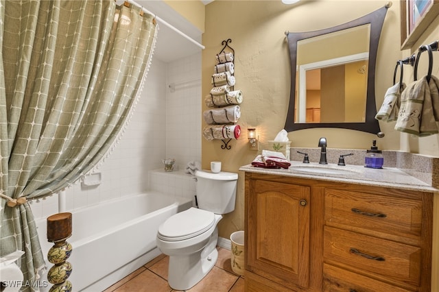 full bathroom with tile patterned floors, vanity, shower / bath combo, and toilet