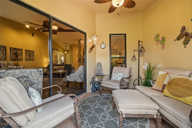 view of patio featuring ceiling fan