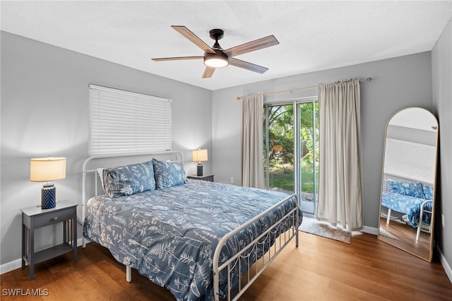 bedroom featuring ceiling fan and hardwood / wood-style flooring