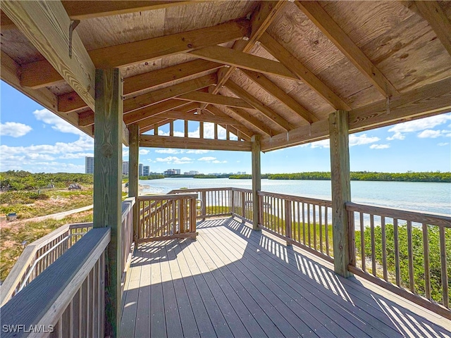 deck featuring a gazebo and a water view