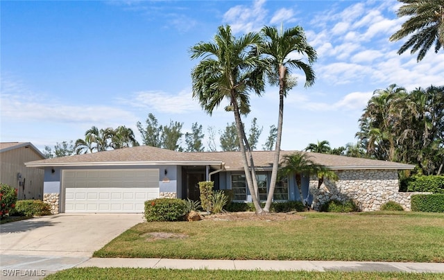 ranch-style house with a front yard and a garage