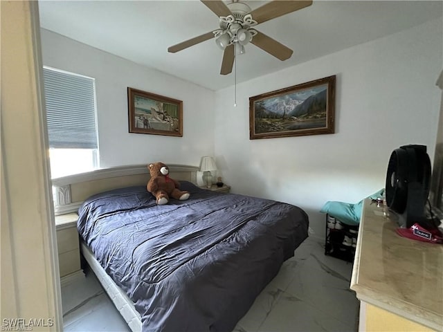 bedroom featuring ceiling fan