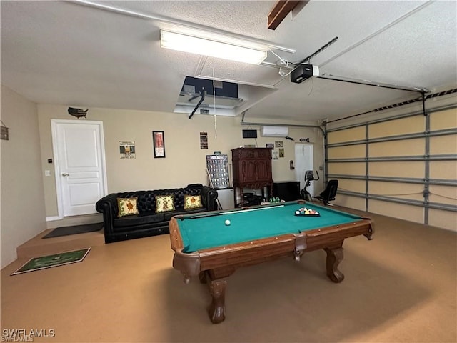 playroom featuring a textured ceiling, pool table, and concrete floors