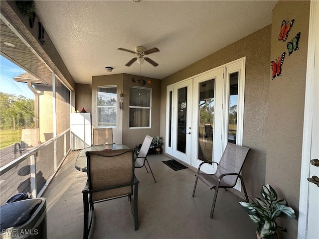 view of patio / terrace featuring ceiling fan and a balcony