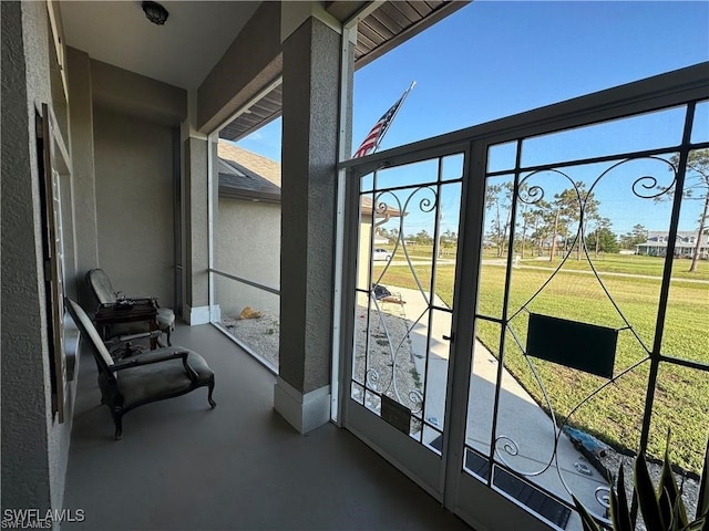 balcony featuring french doors