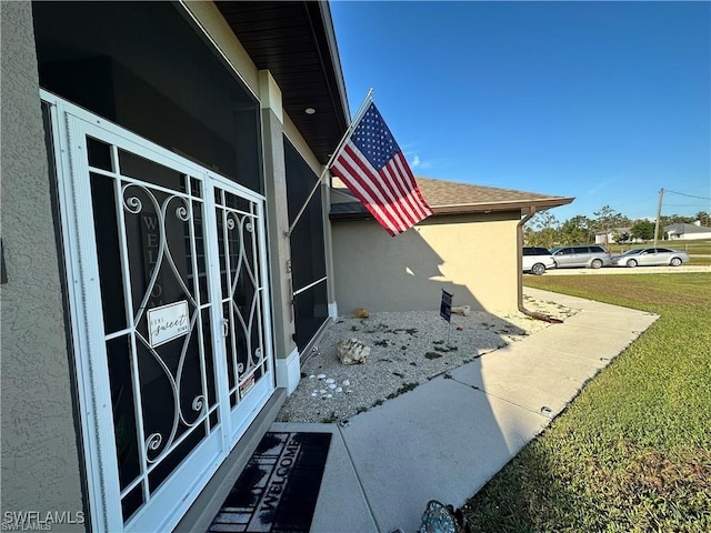 view of home's exterior featuring a yard