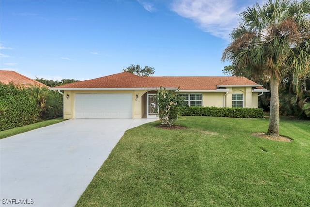 ranch-style home with a front yard and a garage