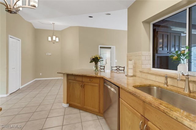 kitchen with light stone countertops, sink, hanging light fixtures, an inviting chandelier, and stainless steel dishwasher