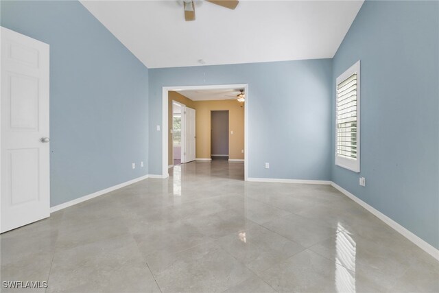 unfurnished room with ceiling fan