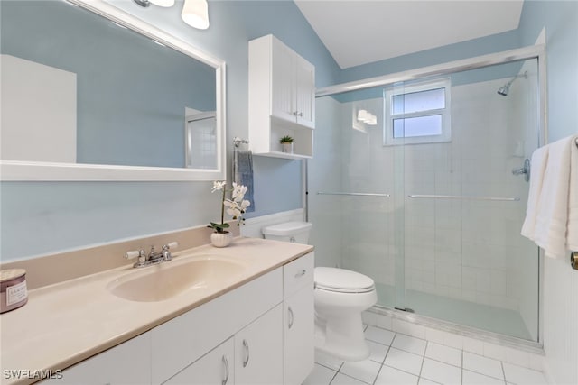 bathroom with tile patterned floors, an enclosed shower, lofted ceiling, toilet, and vanity