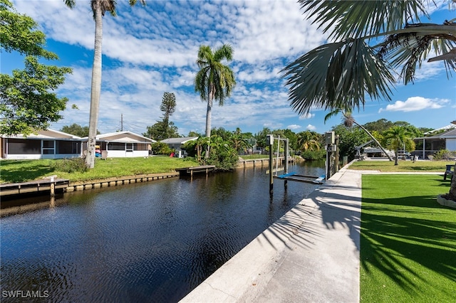 view of water feature with a dock