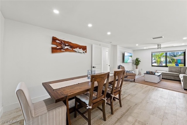 dining room with visible vents, baseboards, light wood-style flooring, and recessed lighting