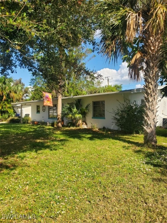 exterior space featuring a front yard