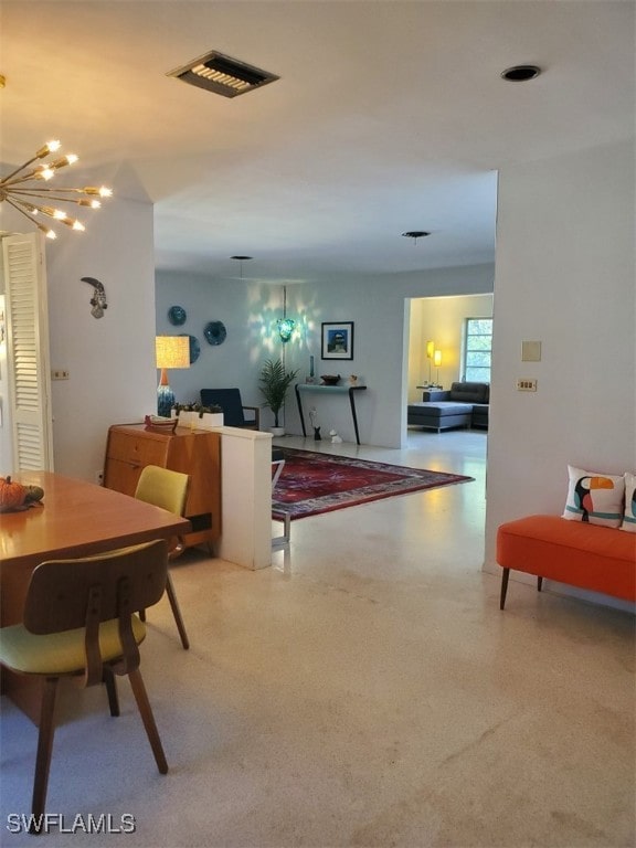 dining room featuring a notable chandelier