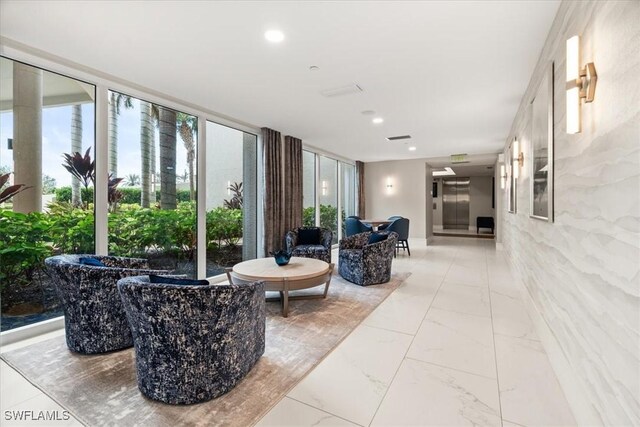 4951 Bonita Bay Blvd Unit 2205, Bonita Springs, FL 34134 - common area featuring recessed lighting and expansive windows