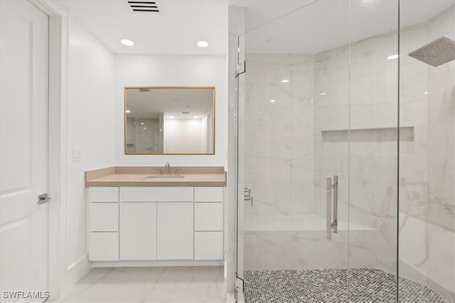4951 Bonita Bay Blvd Unit 2205, Bonita Springs, FL 34134 - bathroom featuring a marble finish shower, marble look tile flooring, vanity, recessed lighting, and baseboards