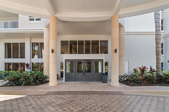 entrance to property featuring french doors