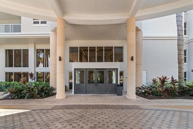 4951 Bonita Bay Blvd Unit 2205, Bonita Springs, FL 34134 - view of exterior entry with french doors