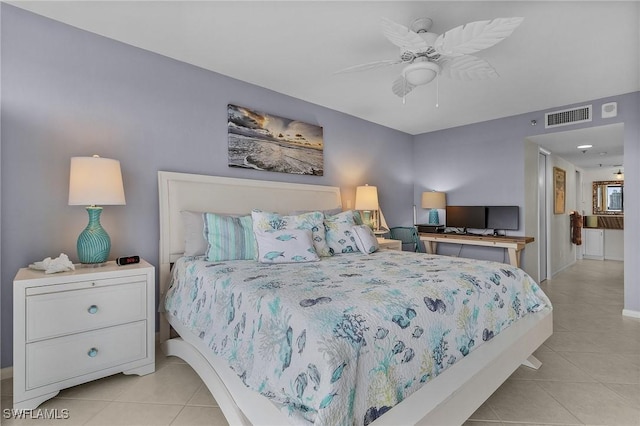 tiled bedroom with visible vents, baseboards, and ceiling fan