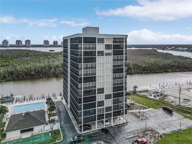 aerial view featuring a view of city and a water view