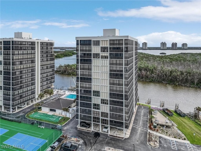 exterior space with a water view