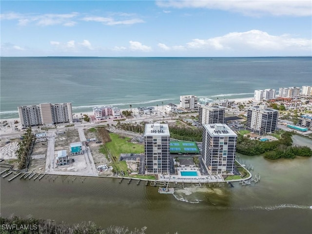 drone / aerial view with a view of city and a water view