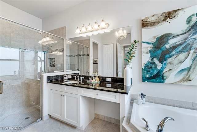 bathroom featuring tile patterned flooring, vanity, and independent shower and bath